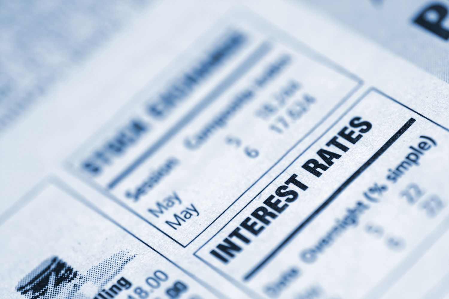 Small Box in a Newspaper Containing Interest Rates Info