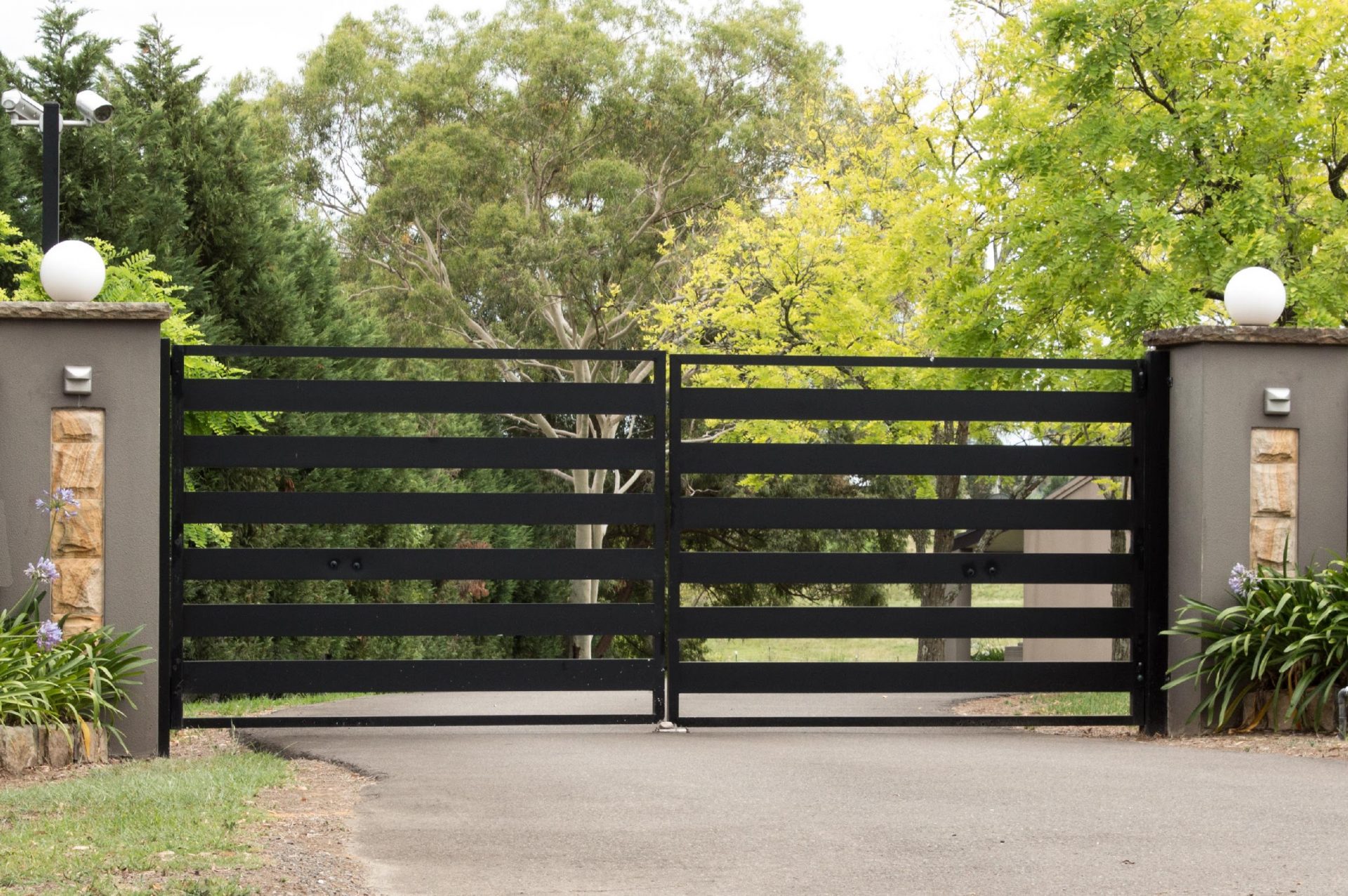 black metal driveway entrance gates set