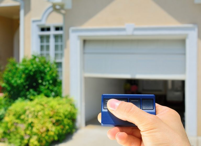 Hand use remote controller for closing and opening garage door