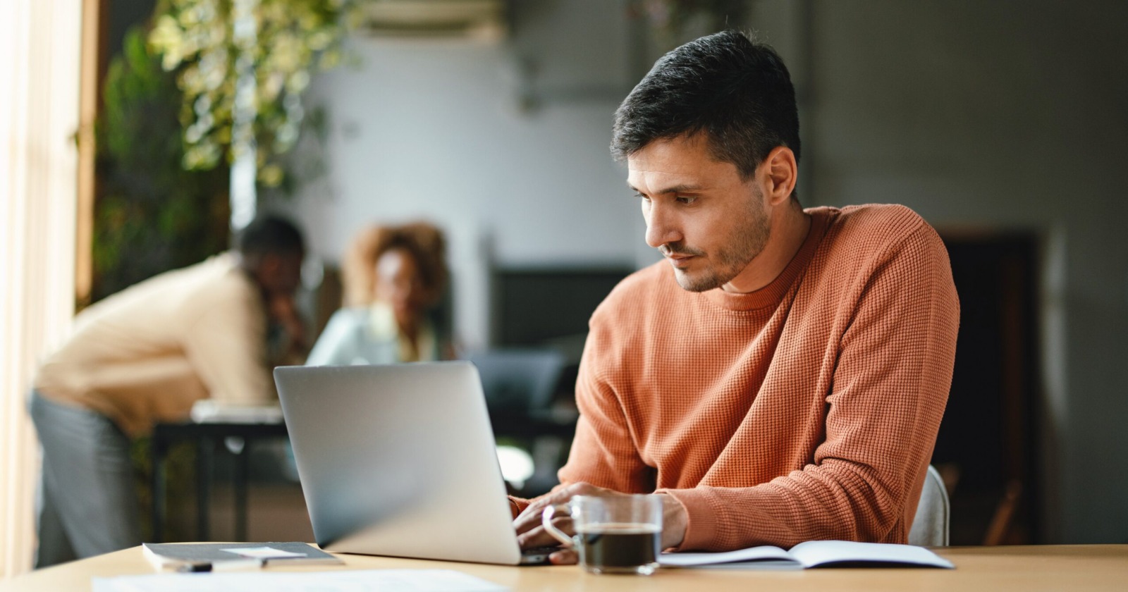 Man looking at a laptop