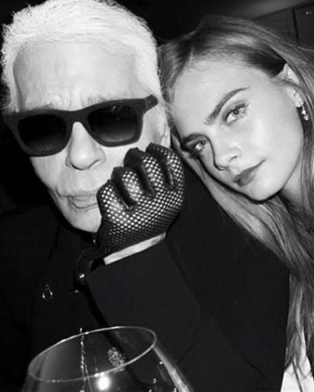 Model, actress and activist Cara Delevinge has recently launched an exclusive gender-neutral collection for KARL LAGERFELD., pictured here with Karl.​