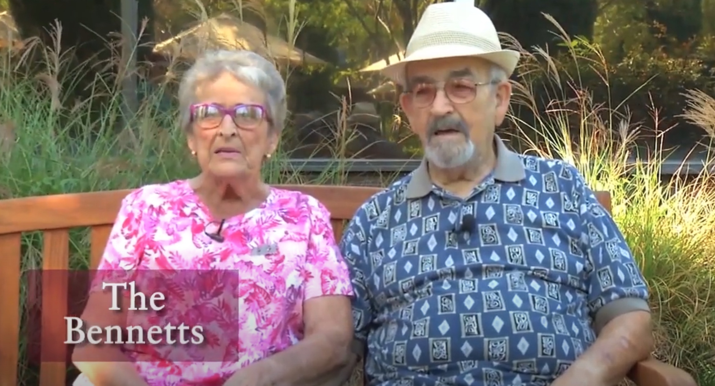 Man and woman sitting on a bench