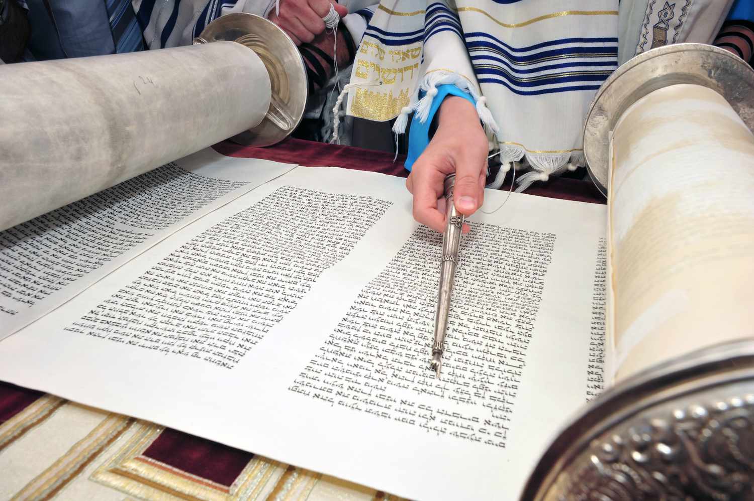 Boy reading Torah for his Bar Mitzvah