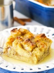 One Serving of Bread Pudding on a White Plate