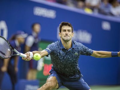 Novak Djokovic battles his way to victory at the US Open Tennis Championship.