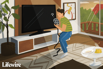 Illustration of a confused person looking for a spot to put an 8mm tape into a modern home theater system