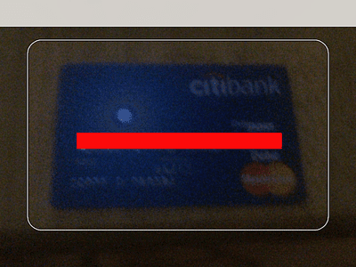 iPhone scanning a credit card in iOS 8