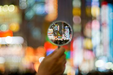 Neon signs through a magnifying glass