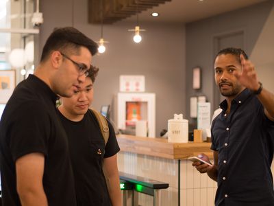 Coleman chatting with attendees at a past Meaningful Gigs event.