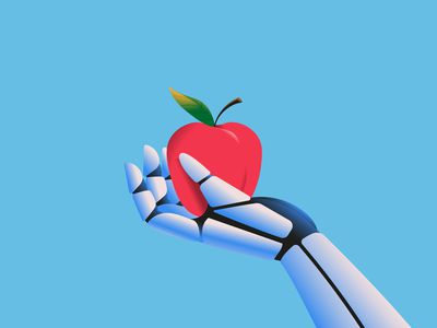 Robot hand holding an apple 