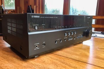 Yamaha home theater receiver on a table.