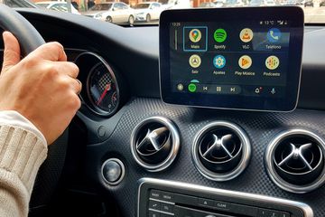 Apple CarPlay displayed on an infotainment system in a car. 