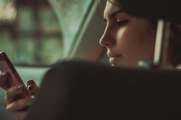 Looking at smartphone in car