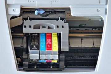 Ink cartridges in a Canon printer.