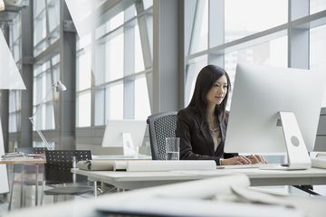 Businesswoman working at computer in office