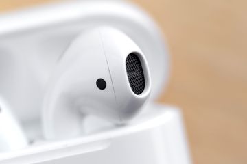 Apple AirPods in a charging case.