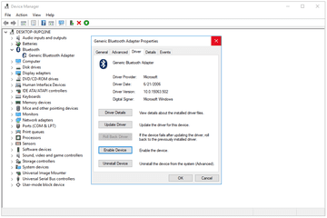 Screenshot showing how to enable a disabled device in Device Manager in Windows 10