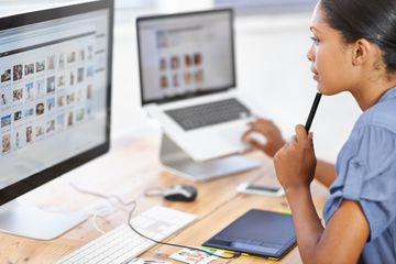 Woman looking at images on computer