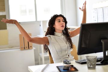 Social media influencer in an office confused over being unfriended on Facebook