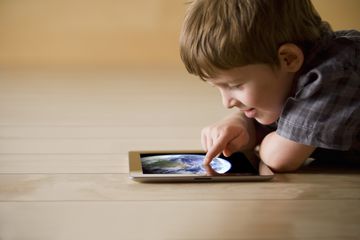 Kid using iPad