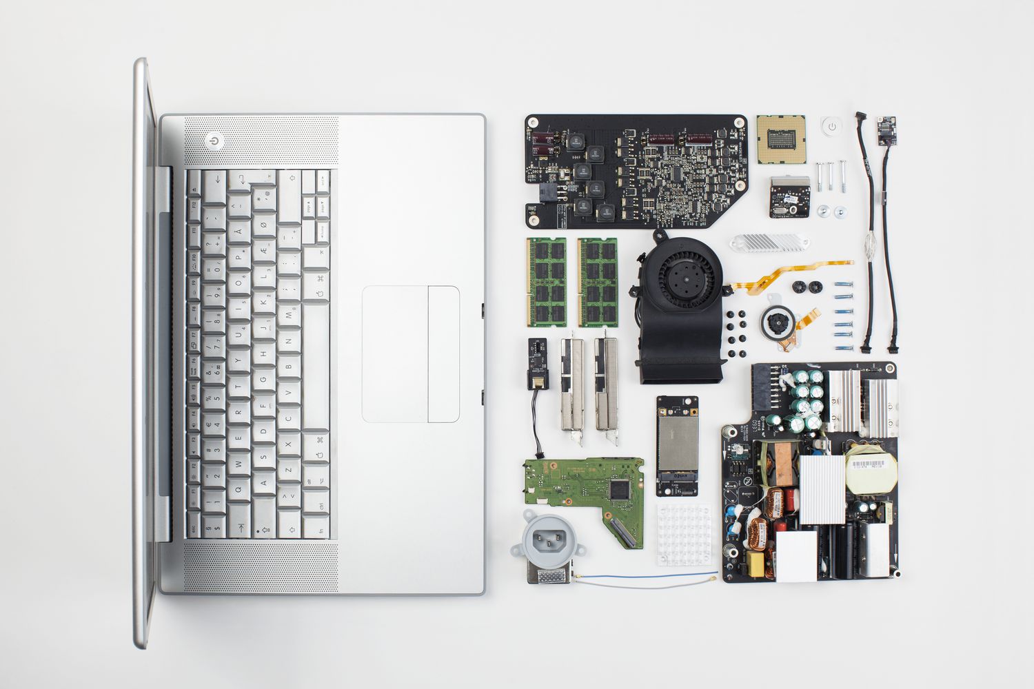 Macbook Pro laptop disassembled with internal components displayed