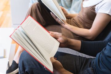 Man and woman reading