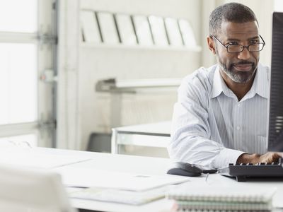 Businessperson at desktop computer