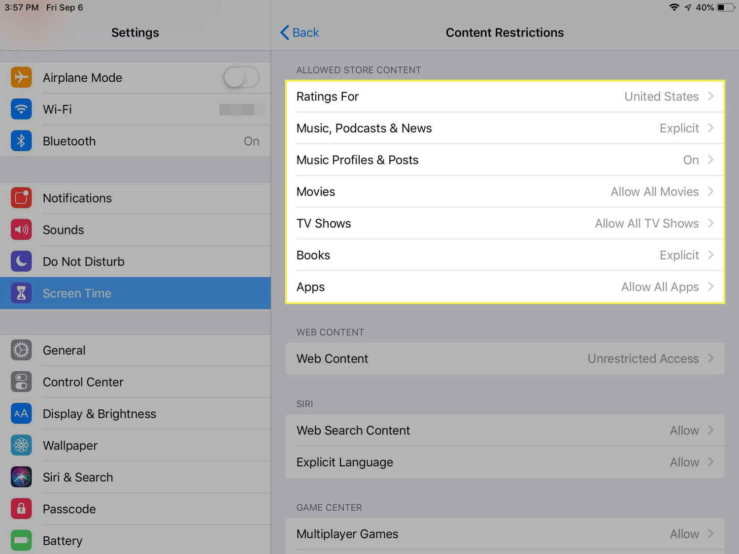 A screenshot of Content Restrictions settings on an iPad with the Allowed Store Content section highlighted