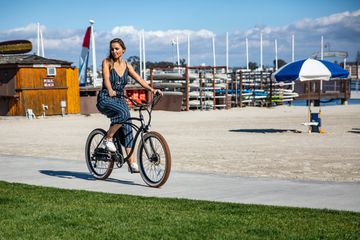  Tower electric bike cruising along the boardwalk