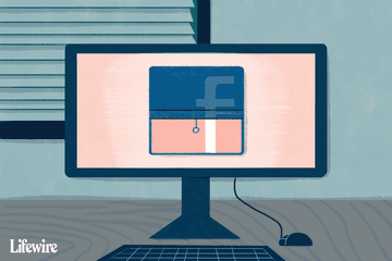 A Facebook logo behind a pull-down window shade on a computer monitor