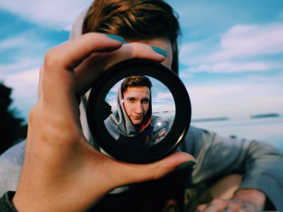 A view of a man through a fisheye lens.