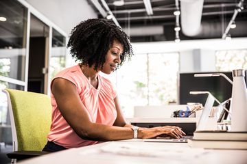 Woman using a computer in an office