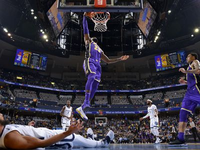 LeBron James dunks in an NBA game.