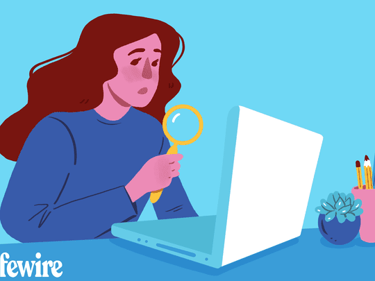 An illustration of a woman searching for something on her computer