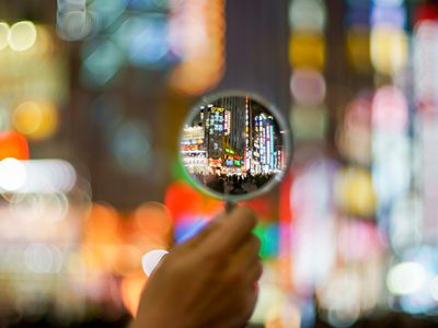 Neon signs through a magnifying glass