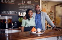 Two small business owners in their tea shop.