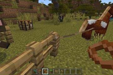 A horse tied to a fence with a Lead in Minecraft