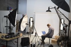 Photographer working in studio