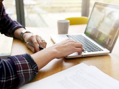 A man uses a laptop computer