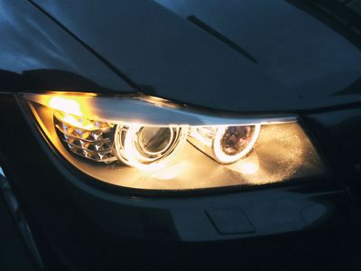 Projector headlights illuminated by halo rings.