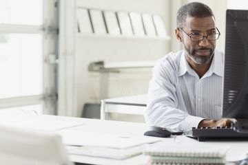 Businessperson at desktop computer