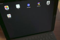 Photo of iPad Pro with icons on-screen.