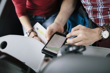 People viewing maps app on a smartphone