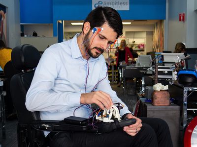 A scientist working on a hands free wheelchair.