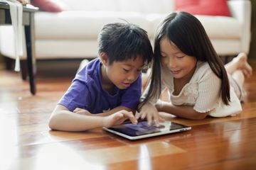 2 Children using tablet