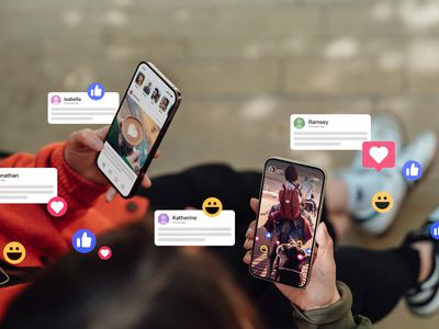 Two female hands holding their smartphones, connecting with social media