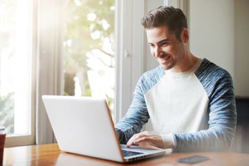 man on a computer