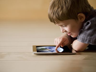 Kid using iPad