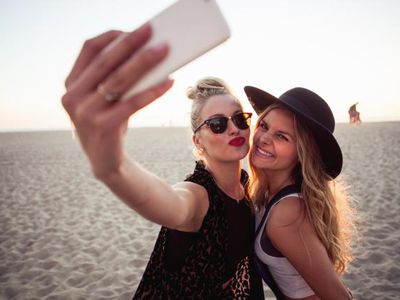 Two Women Taking a Selfie on the Beach