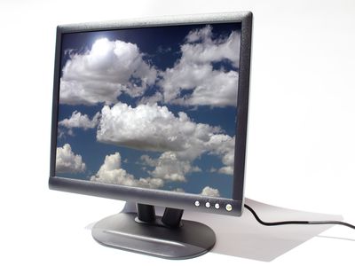 A computer monitor displaying a screensaver.